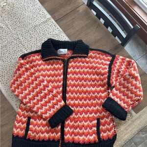Del Mundo heavy hand knit sweater.